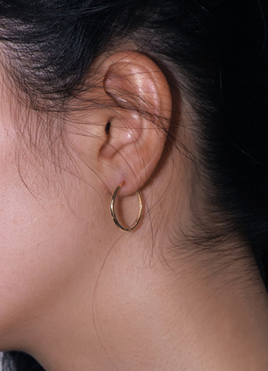 ニートフープピアス(20mm/16KGP) Teilen