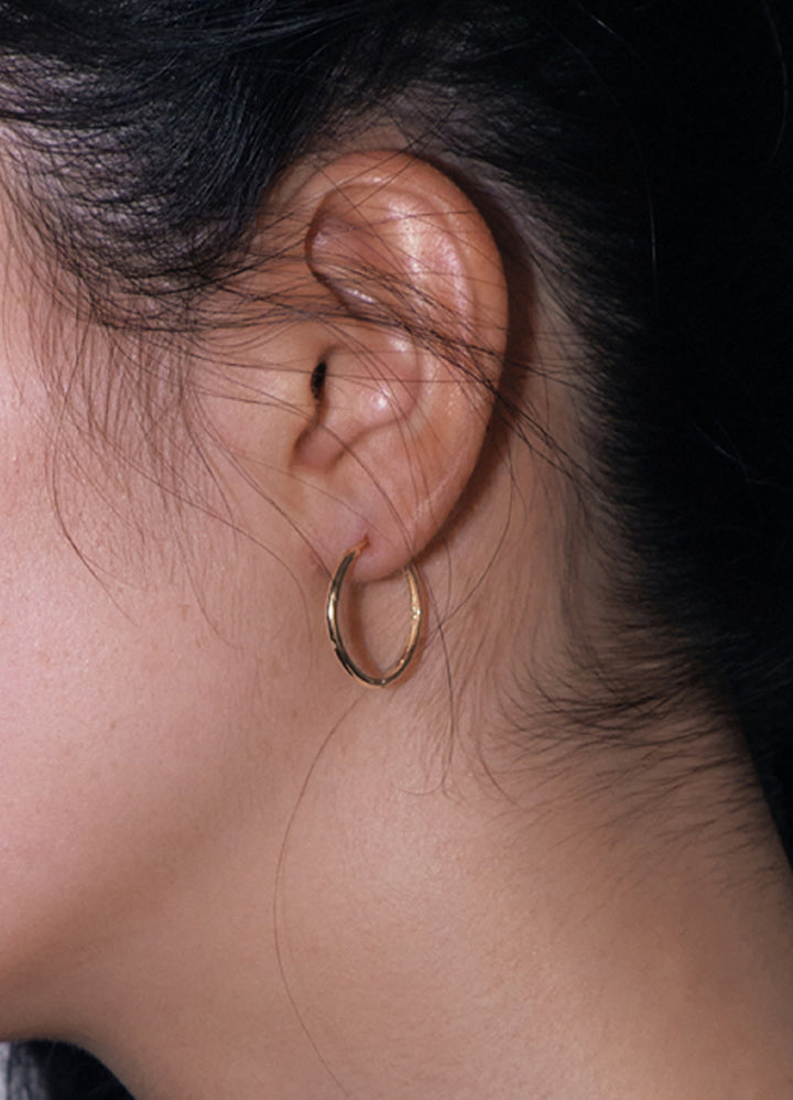 ニートフープピアス(20mm/16KGP) Teilen