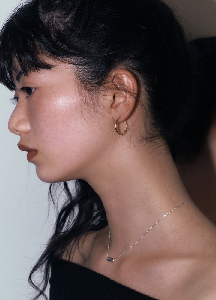 ニートフープピアス(20mm/16KGP) Teilen